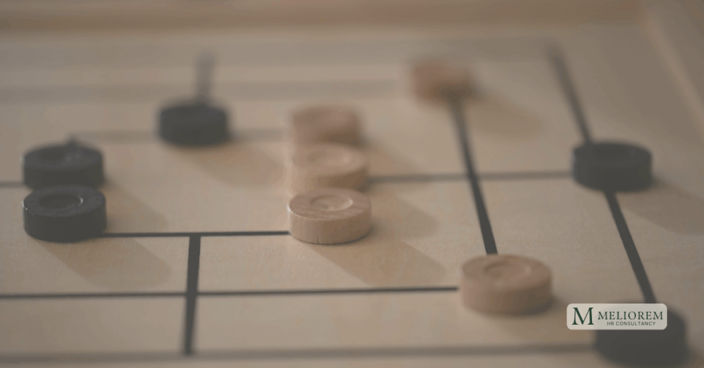The Fractional HR Model. An image of a draught set showing just how easy it is to pull a fractional person in and out of a business.